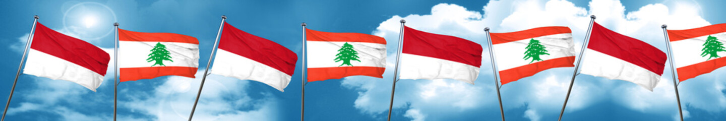 Fototapeta na wymiar monaco flag with Lebanon flag, 3D rendering