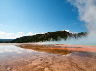 Grand Prismatic Spring during the day in the Midway Geyser Basin in Yellowstone National Park in Wyoming USA