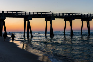 Fototapeta na wymiar Peir at Panama City Beach, Florida at Sunrise