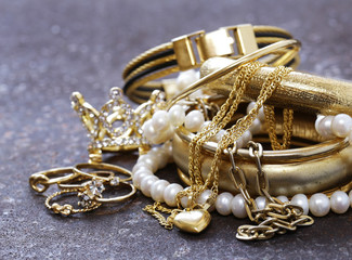 gold jewelry and pearls, bracelets and chains © Olga Kriger