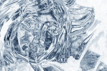 Woman's face carved from ice