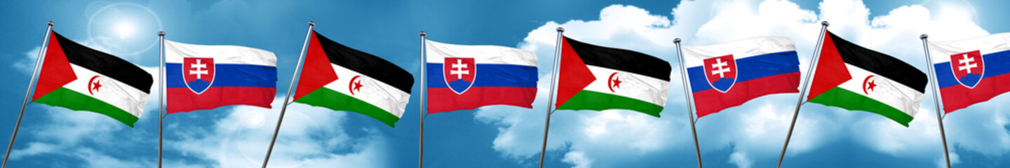Fototapeta na wymiar Western sahara flag with Slovakia flag, 3D rendering