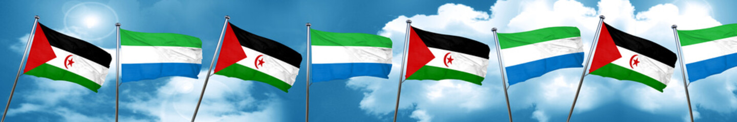 Western sahara flag with Sierra Leone flag, 3D rendering