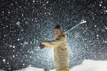 Night landscape with silhouette skier