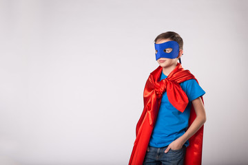 Super hero boy in superman costume