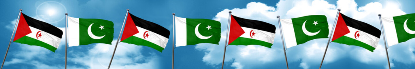 Fototapeta na wymiar Western sahara flag with Pakistan flag, 3D rendering