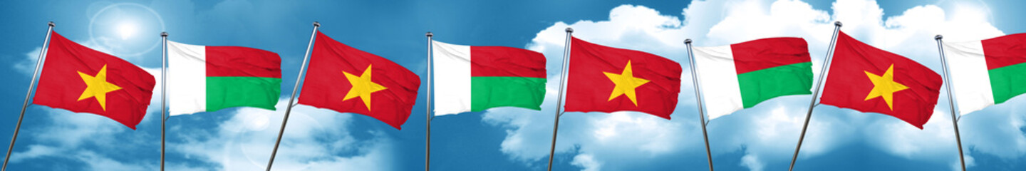 Vietnam flag with Madagascar flag, 3D rendering