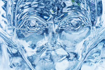 Woman's face carved from ice