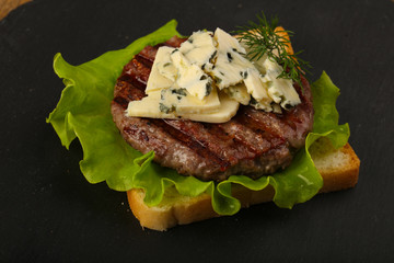 Sandwich with blue cheese and burger cutlet