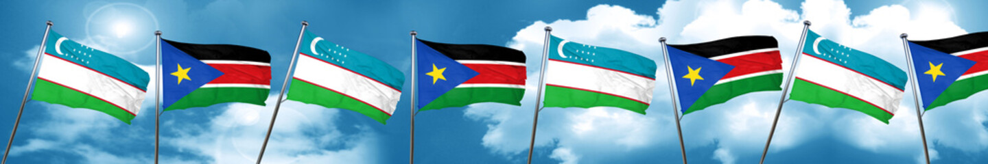 Uzbekistan flag with South Sudan flag, 3D rendering