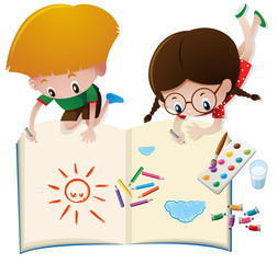 Two kids drawing on big book