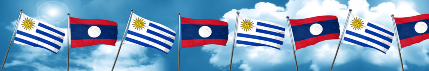 Fototapeta premium Uruguay flag with Laos flag, 3D rendering
