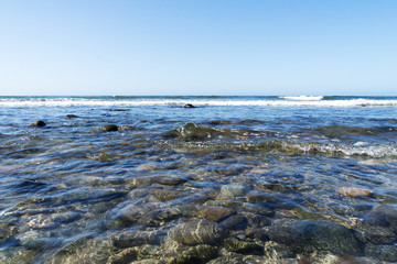 Fototapeta na wymiar Awesome clear Water at Maspalomas Beach / Spain