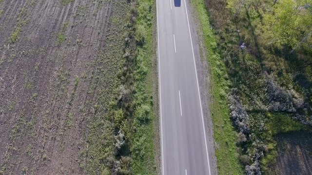 Aerial view, flight over a cauntry road