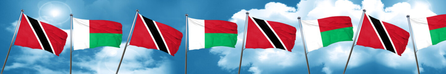 Trinidad and tobago flag with Madagascar flag, 3D rendering