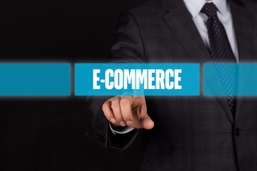 Hand pushing on a touch screen interface-E-COMMERCE button