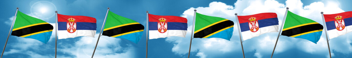 Tanzanian flag with Serbia flag, 3D rendering