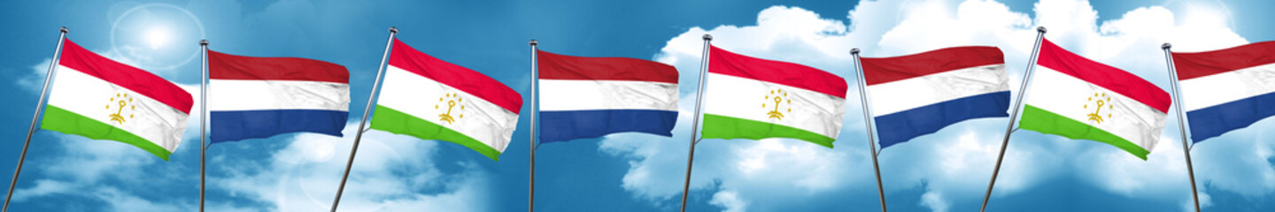 Tajikistan flag with Netherlands flag, 3D rendering
