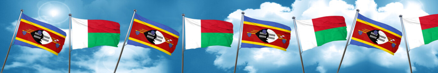 Swaziland flag with Madagascar flag, 3D rendering