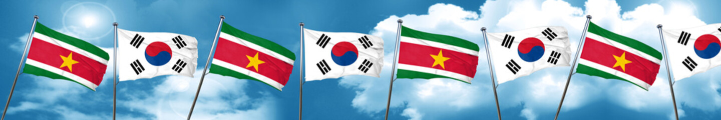 Suriname flag with South Korea flag, 3D rendering