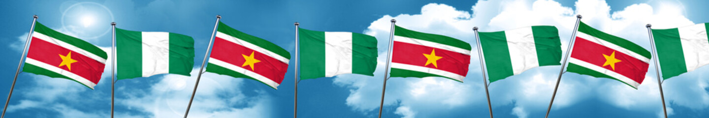 Suriname flag with Nigeria flag, 3D rendering