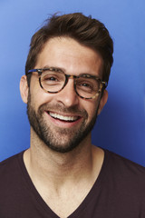 Smiling guy in glasses, portrait