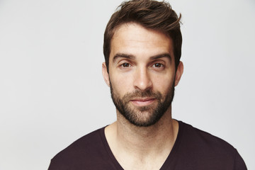 Confident guy looking at camera