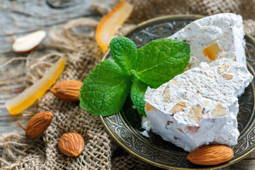 Almond nougat with candied fruit and mint.