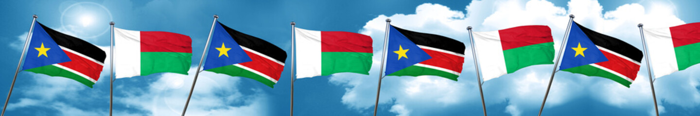 Fototapeta na wymiar south sudan flag with Madagascar flag, 3D rendering