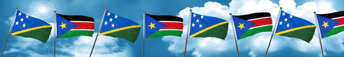 Fototapeta na wymiar Solomon islands flag with South Sudan flag, 3D rendering