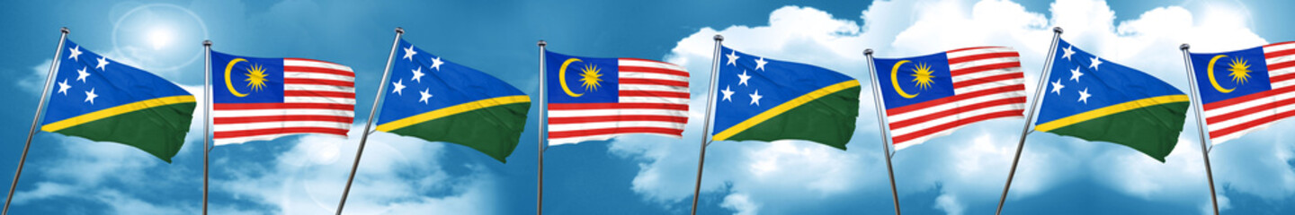 Solomon islands flag with Malaysia flag, 3D rendering