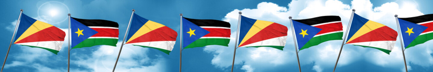 Fototapeta na wymiar seychelles flag with South Sudan flag, 3D rendering