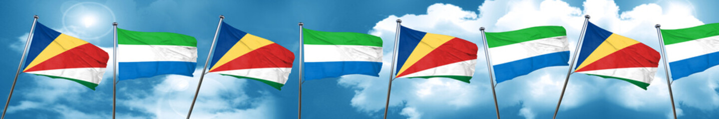 seychelles flag with Sierra Leone flag, 3D rendering