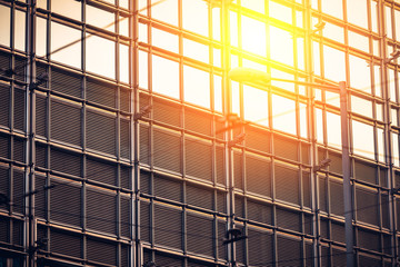 Fototapeta na wymiar Commercial building with sun ray on right corner
