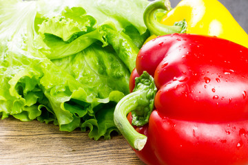bell peppers and green salad on the table
