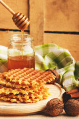 Waffles and glass with honey