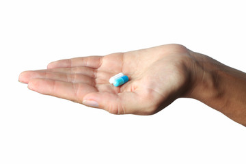 Medicine in palm on white background