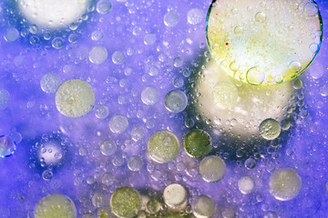 Abstract, colorful composition with oil, water and ink