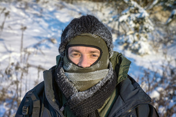 Fototapeta na wymiar Portrait of a man on a frosty day.