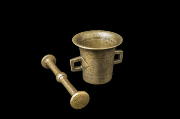 Mortar for spices on a black background