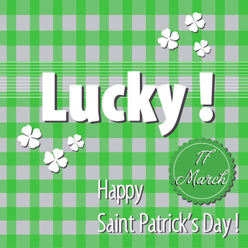 Green background with white clovers and the text lucky, Happy Saint Patrick`s Day written in white