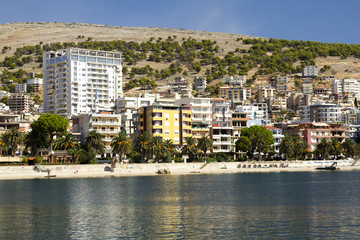 Adriatic coast with the sea and the town (Albania). Coast Resort.