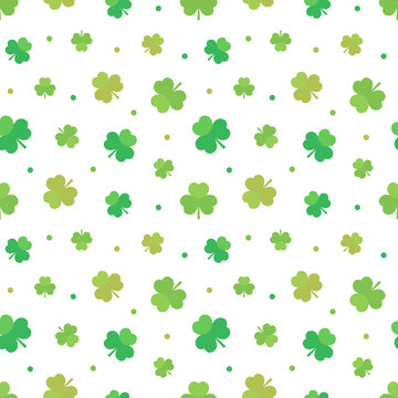 St.Patrick's Day seamless pattern background with green clover, shamrock and dots.