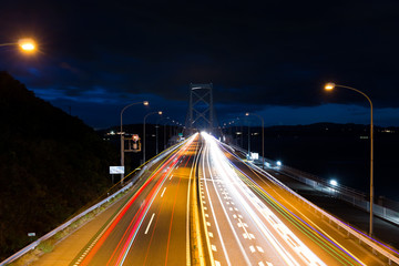 Fototapeta na wymiar Highway with traffic at night