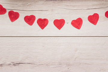 Plakat red heart on a wooden background