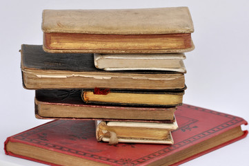 Tower of ancient books in balance