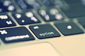 Fototapeta na wymiar Closeup computer keyboard and soft focus background