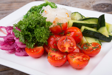 Pickled vegetables on a white plate