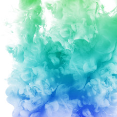 Acrylic colors and ink in water. Ink swirling in water. Ink in water isolated.   Colorful ink in...