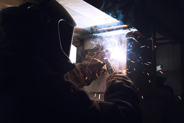 welder working on a construction site
